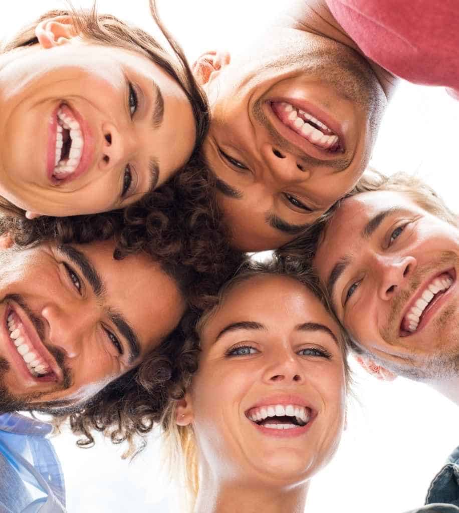Smiling person showcasing white teeth after laser whitening treatment Leamington Spa